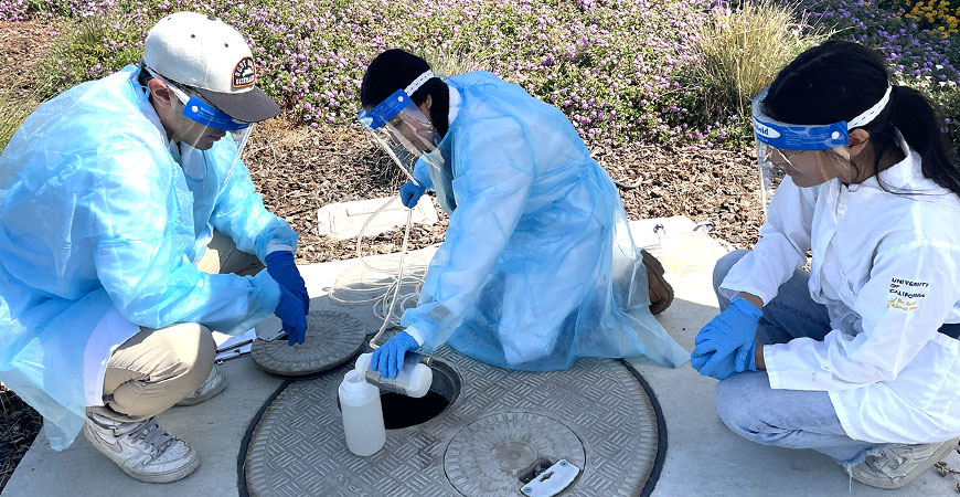 UC Merced researchers extract sewage samples from university system